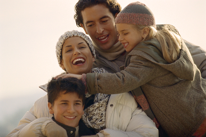 A family enjoying the Canadian winter outdoors